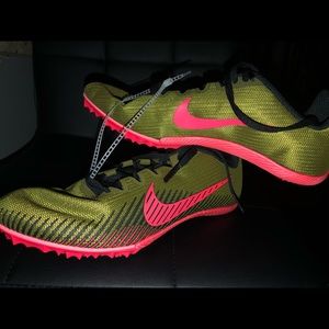 Brand new Nike Racing shoes
